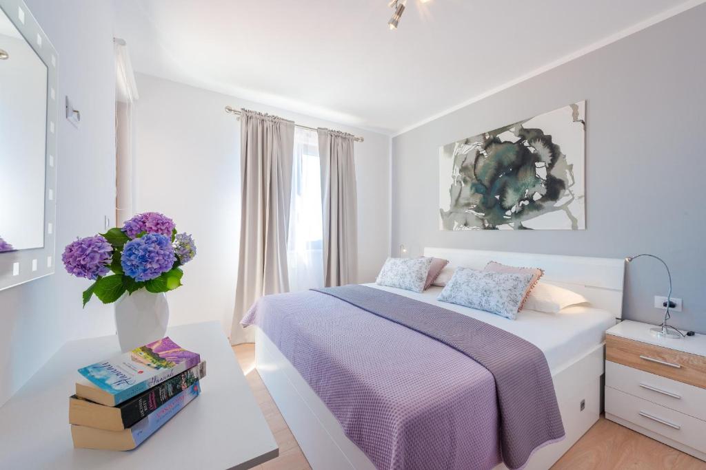 Postel nebo postele na pokoji v ubytování Apartments Villa Made 4U