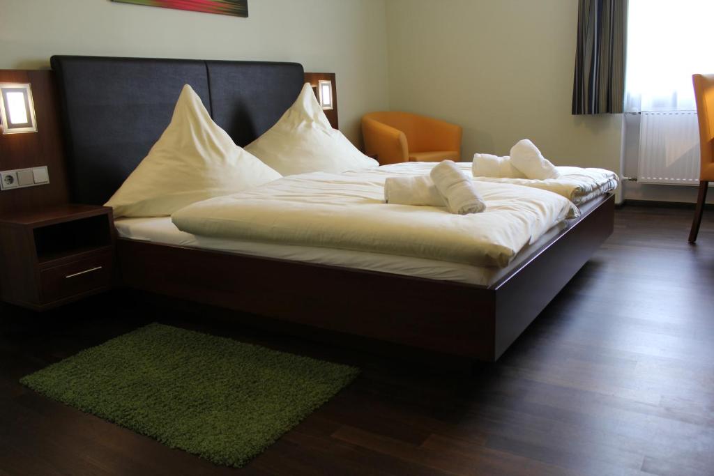 Katil atau katil-katil dalam bilik di Hotel Brantl