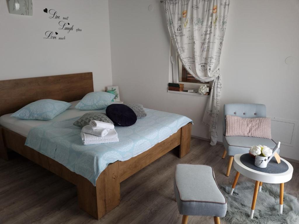 Posteľ alebo postele v izbe v ubytovaní Apartment LELA