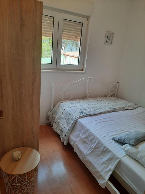 Posteľ alebo postele v izbe v ubytovaní Apartments Jurić - Zablaće