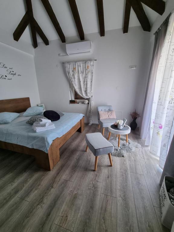 Posteľ alebo postele v izbe v ubytovaní Apartment LELA