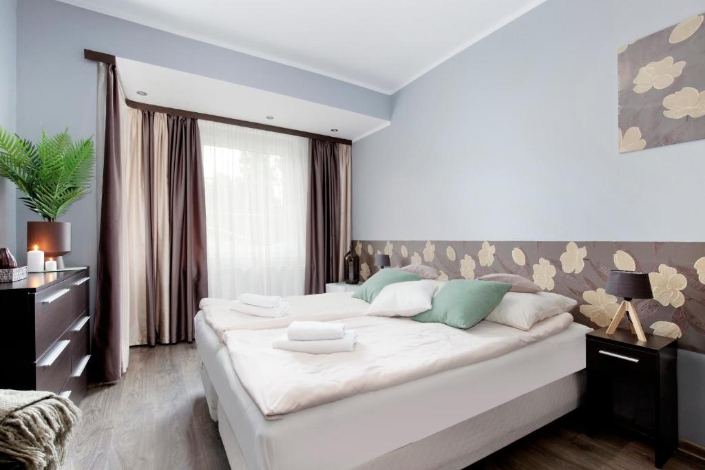 Posteľ alebo postele v izbe v ubytovaní Guesthouse Baltic