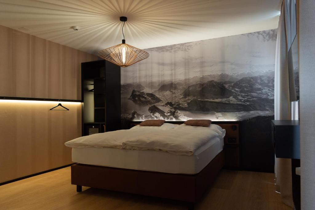 Postel nebo postele na pokoji v ubytování Boutique Hotel Stanserhof