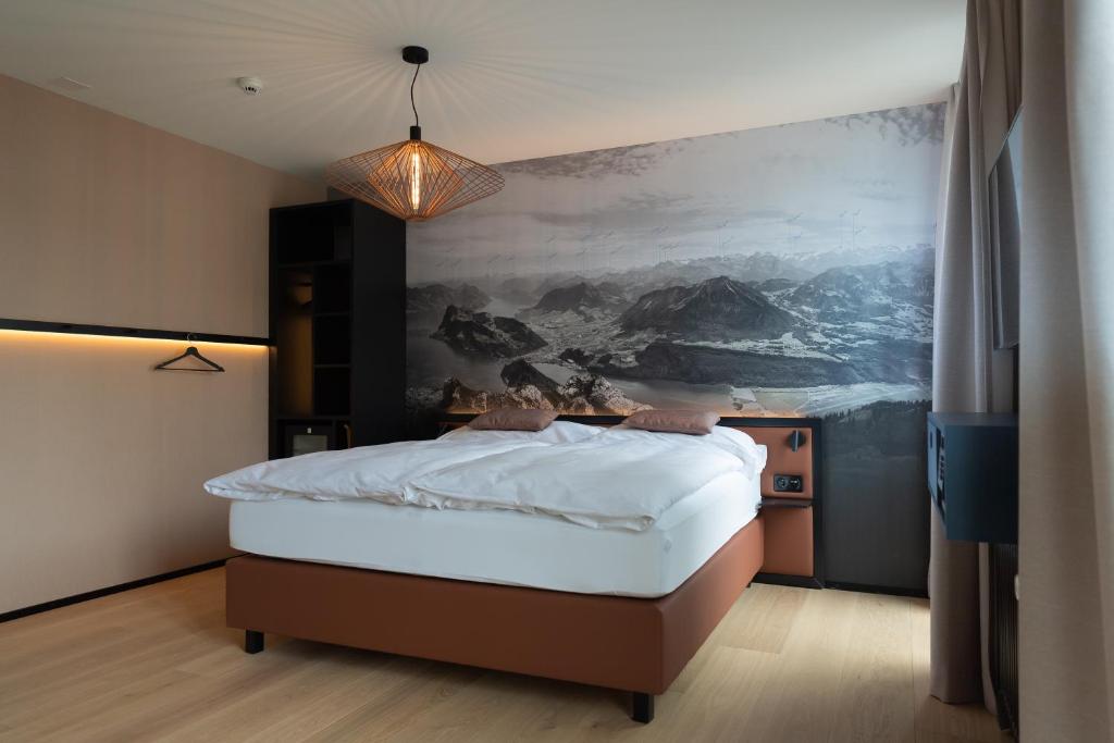 Postel nebo postele na pokoji v ubytování Boutique Hotel Stanserhof