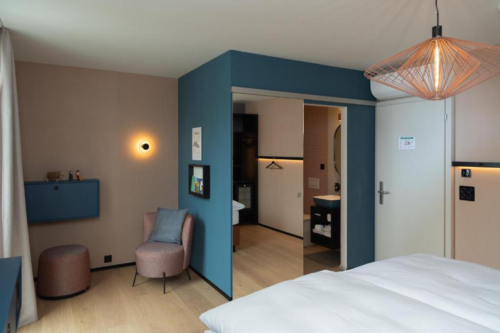 Postel nebo postele na pokoji v ubytování Boutique Hotel Stanserhof
