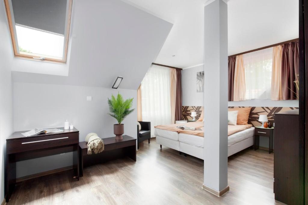 Posteľ alebo postele v izbe v ubytovaní Guesthouse Baltic