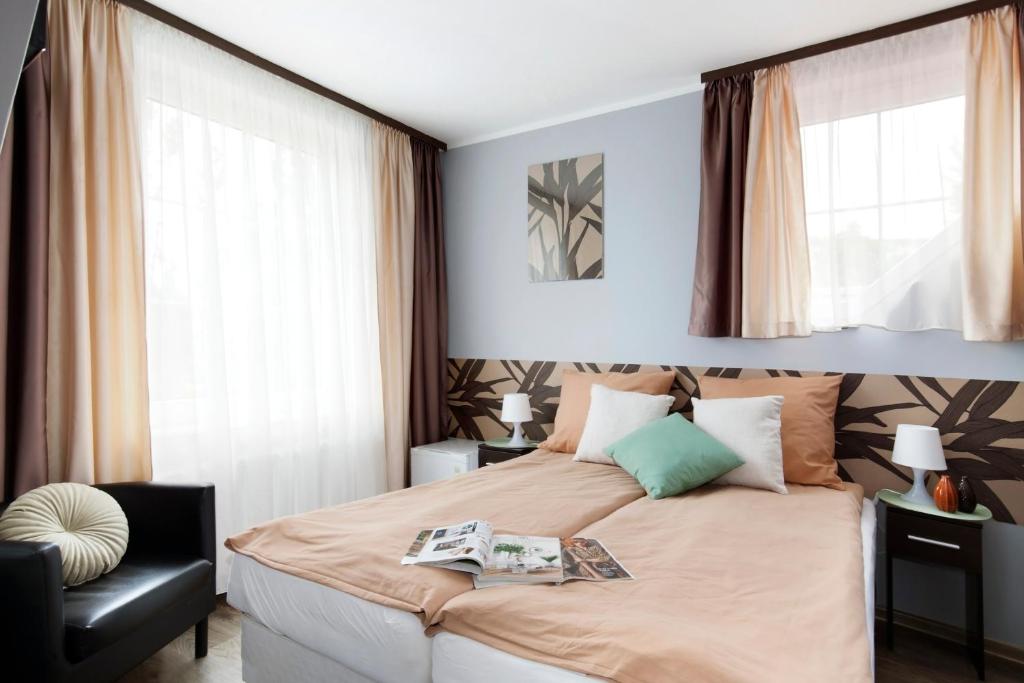 Posteľ alebo postele v izbe v ubytovaní Guesthouse Baltic