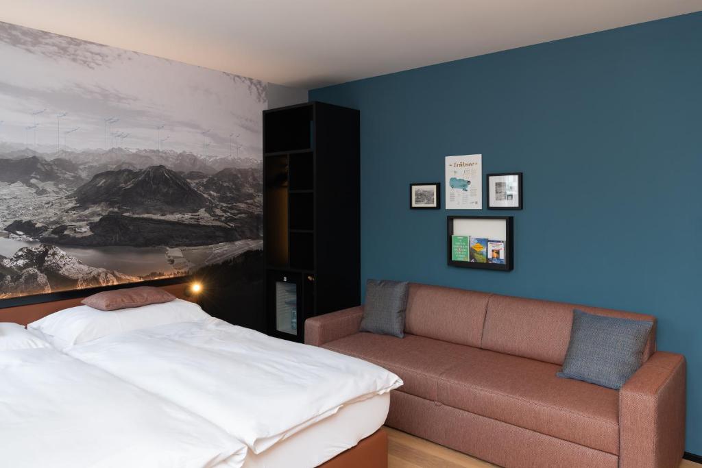 Postel nebo postele na pokoji v ubytování Boutique Hotel Stanserhof