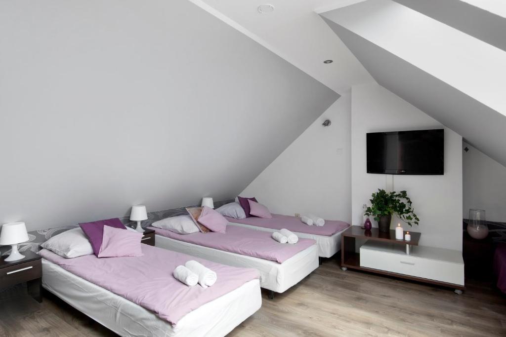 Posteľ alebo postele v izbe v ubytovaní Guesthouse Baltic