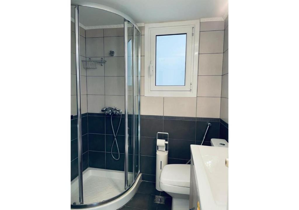 Kúpeľňa v ubytovaní Cozy Apartment in Central Athens - Sleeps 6