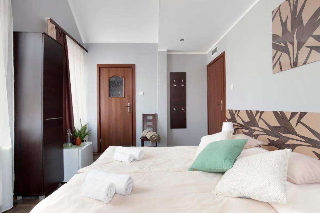 Posteľ alebo postele v izbe v ubytovaní Guesthouse Baltic