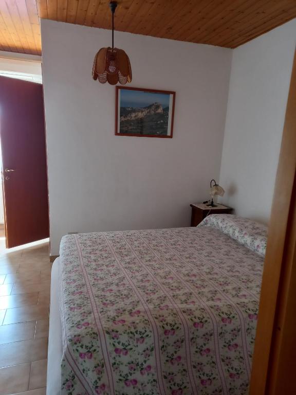 Postel nebo postele na pokoji v ubytování B&B Isabella