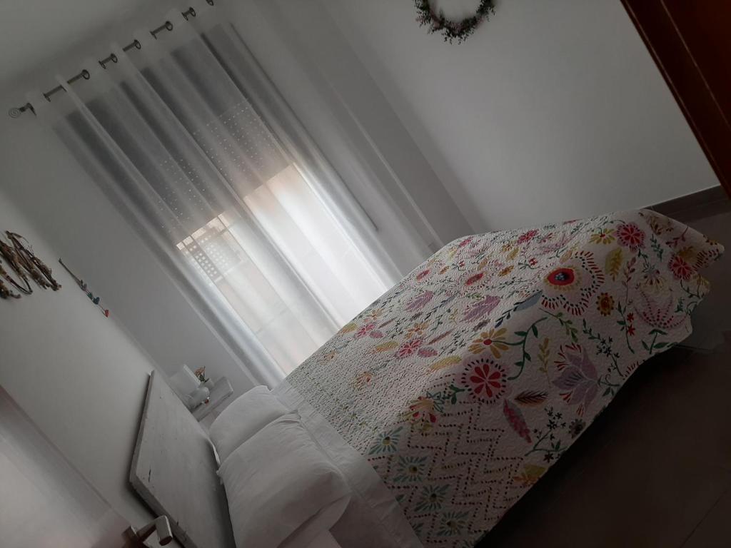 Postel nebo postele na pokoji v ubytování Gran terraza con piscina