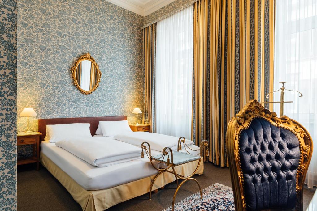 Postel nebo postele na pokoji v ubytování Das Kleine Hotel in ruhiger Stadtlage