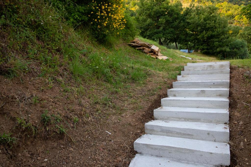 a set of concrete steps leading up a hill at 4 Studios Becic in Budva