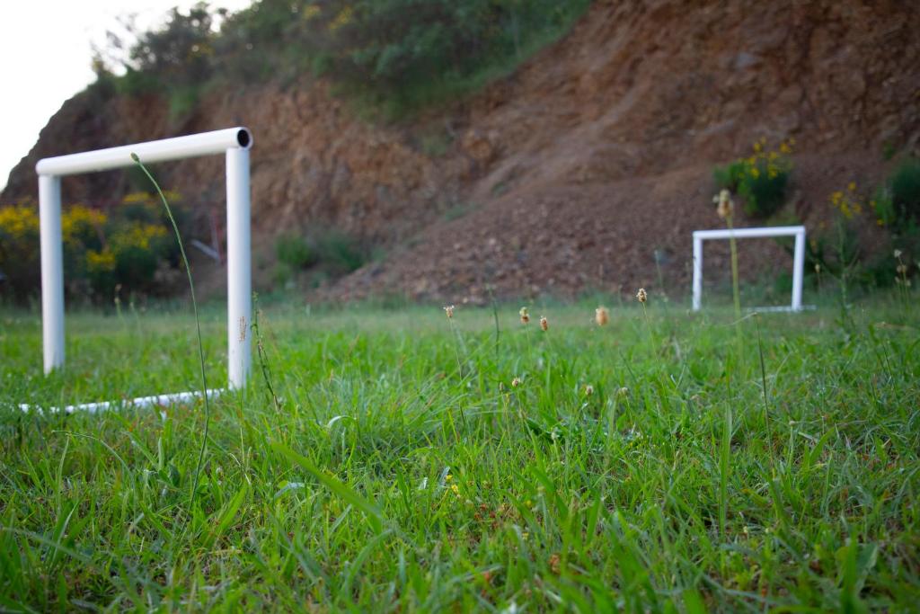two soccer goals in a field of grass at 4 Studios Becic in Budva