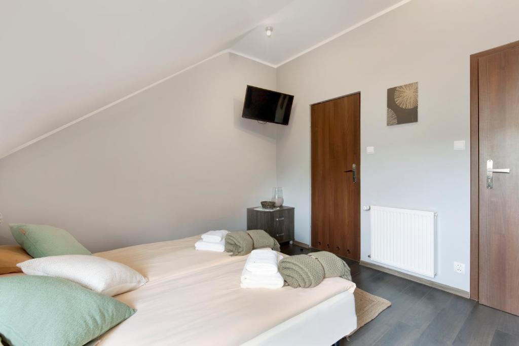 Posteľ alebo postele v izbe v ubytovaní Guesthouse Baltic