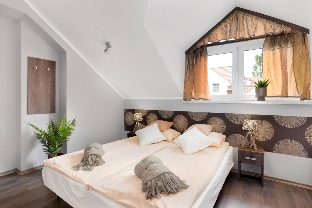 Posteľ alebo postele v izbe v ubytovaní Guesthouse Baltic