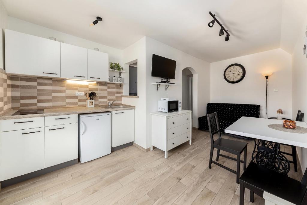 Kuchyň nebo kuchyňský kout v ubytování Pod Koblo Bohinj Apartments