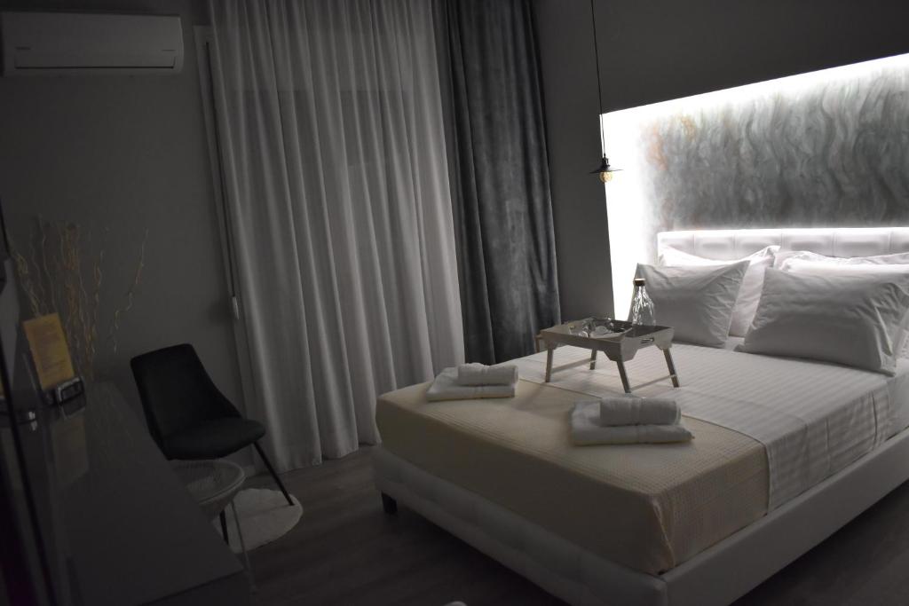 Cama o camas de una habitación en Raffinato Suite (Cielo suites)