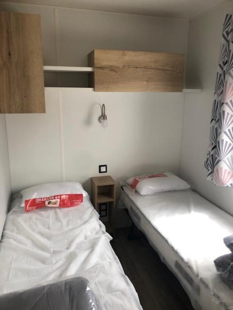 Postel nebo postele na pokoji v ubytování Mobilhome Canet en Roussillon - CANET PLAGE LOC