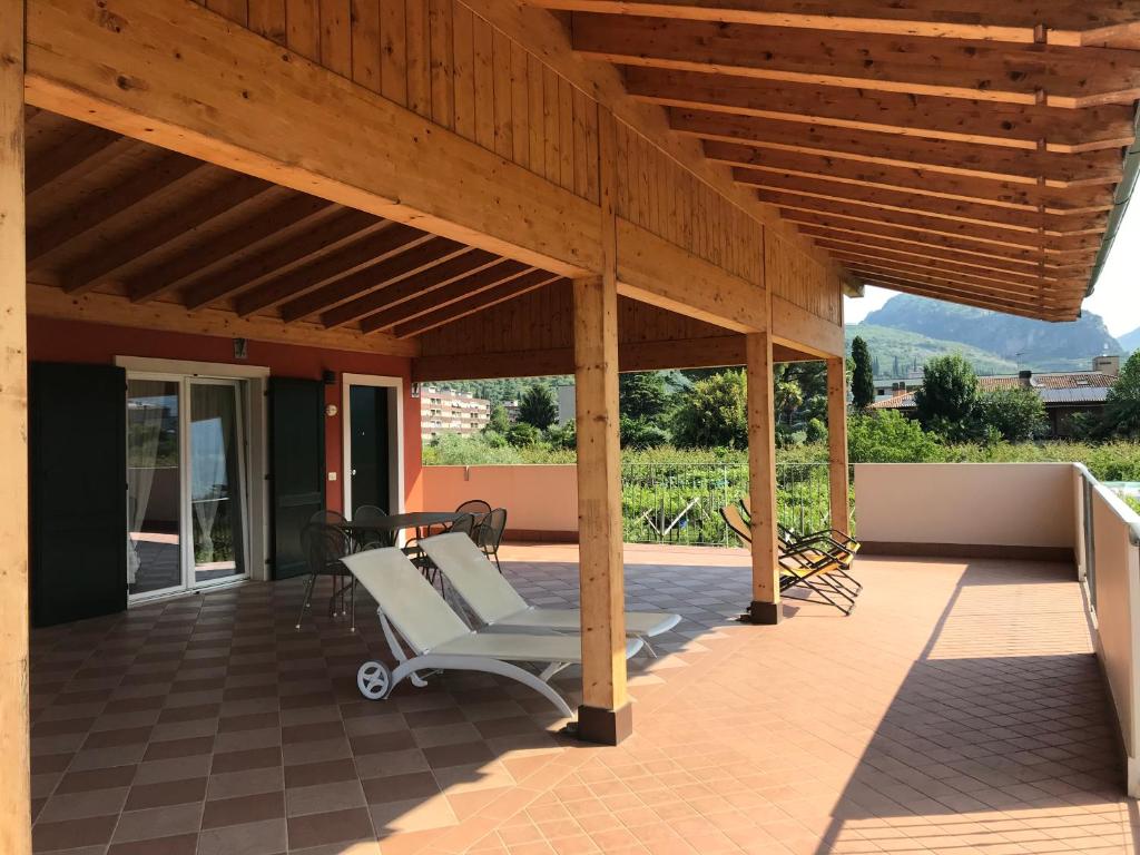 a pavilion with chairs on a patio at Agriturismo Maso Bergot in Arco