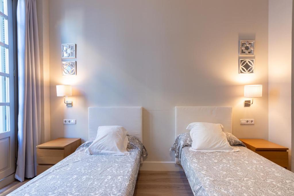 Posteľ alebo postele v izbe v ubytovaní Urbe10 Angel Suites 2 Bedrooms Apartment 2A