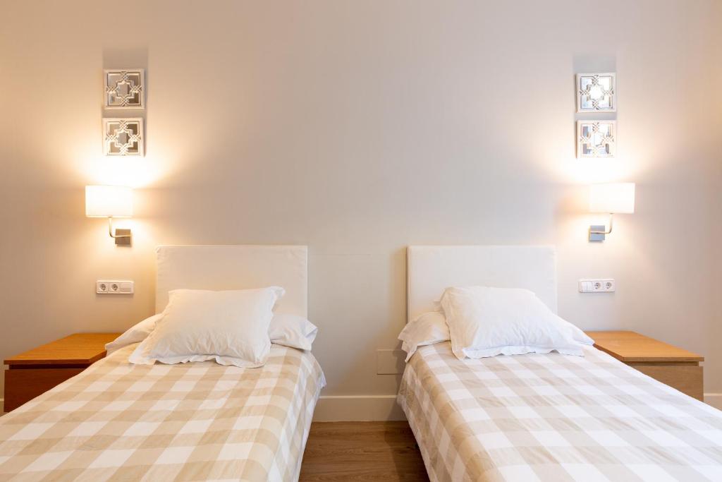 Posteľ alebo postele v izbe v ubytovaní Urbe10 Angel Suites 2 Bedrooms Apartment 2A