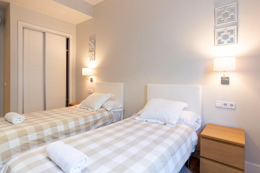 Posteľ alebo postele v izbe v ubytovaní Urbe10 Angel Suites 2 Bedrooms Apartment 2A