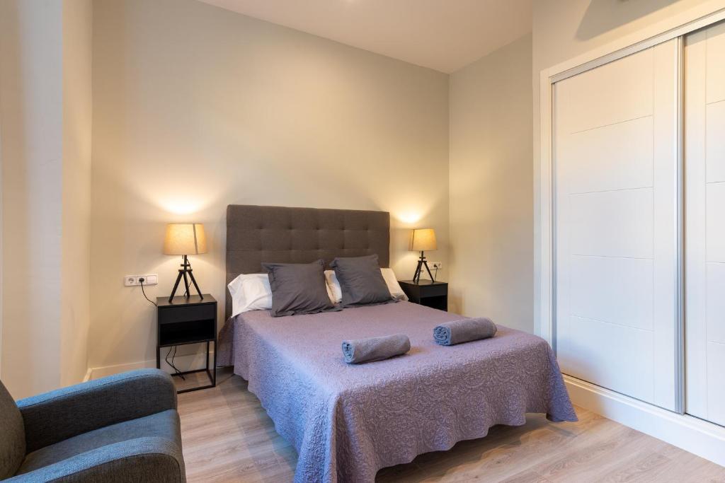 Postel nebo postele na pokoji v ubytování Urbe10 Angel Suites 1 Bedroom Apartment 3C