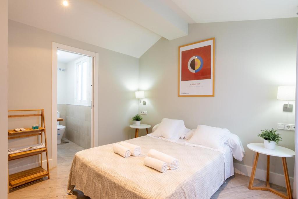 Postel nebo postele na pokoji v ubytování Urbe10 Angel Suites Apartment 4B