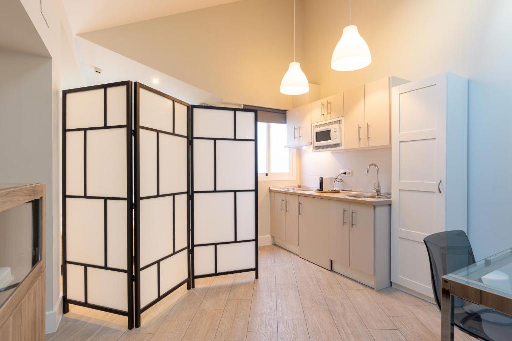 Kuchyň nebo kuchyňský kout v ubytování Urbe10 Angel Suites Apartment 4B