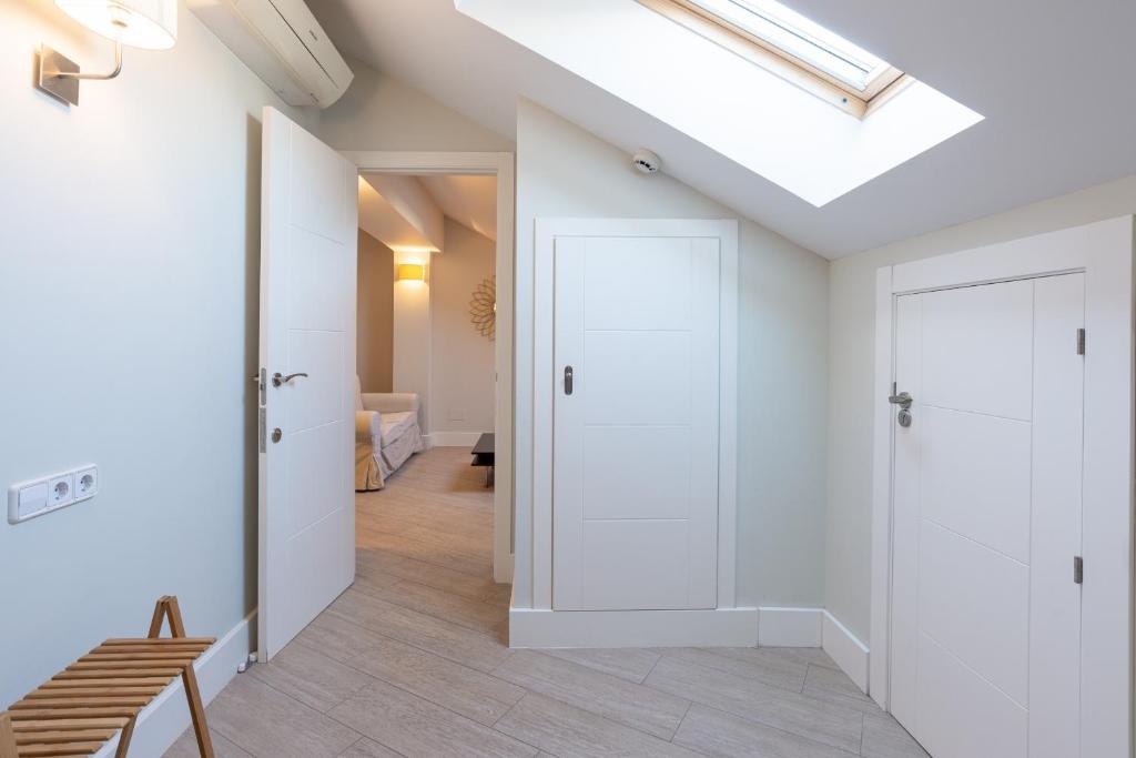 Postel nebo postele na pokoji v ubytování Urbe10 Angel Suites Apartment 4B