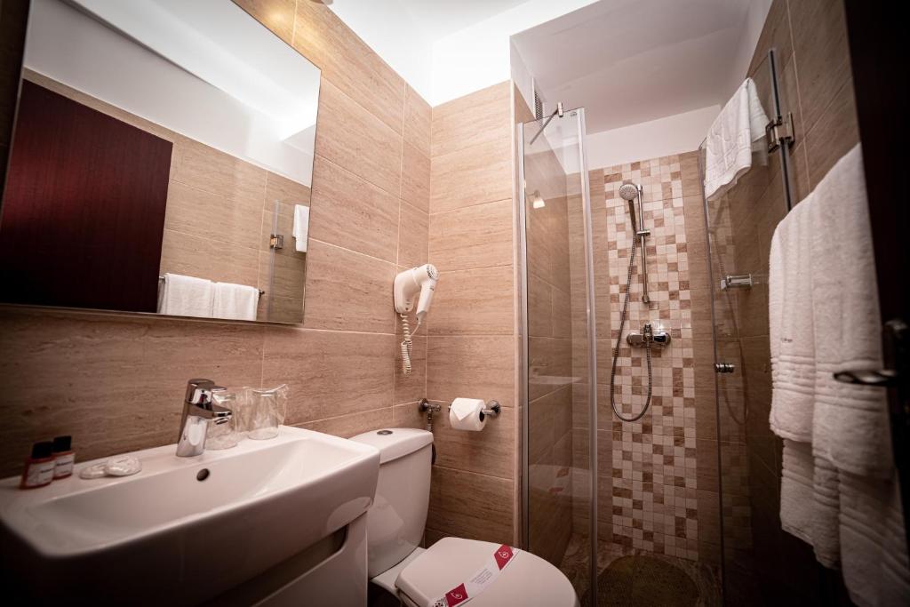 Koupelna v ubytování Hotel Corina