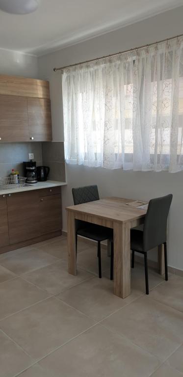 Kuchyňa alebo kuchynka v ubytovaní AVR Airport Deluxe Suites 6 AIRPORT FREE SHUTLE