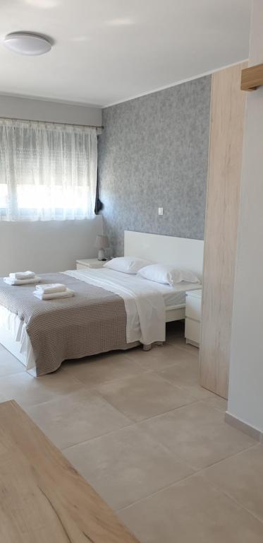 Posteľ alebo postele v izbe v ubytovaní AVR Airport Deluxe Suites 6 AIRPORT FREE SHUTLE