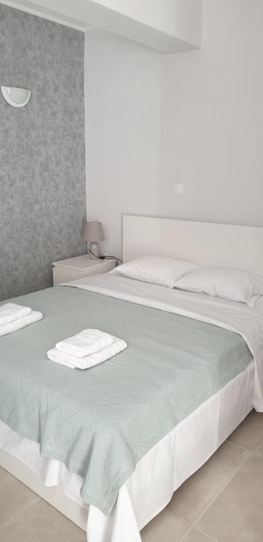 Posteľ alebo postele v izbe v ubytovaní AVR Airport Deluxe Suites 6 AIRPORT FREE SHUTLE