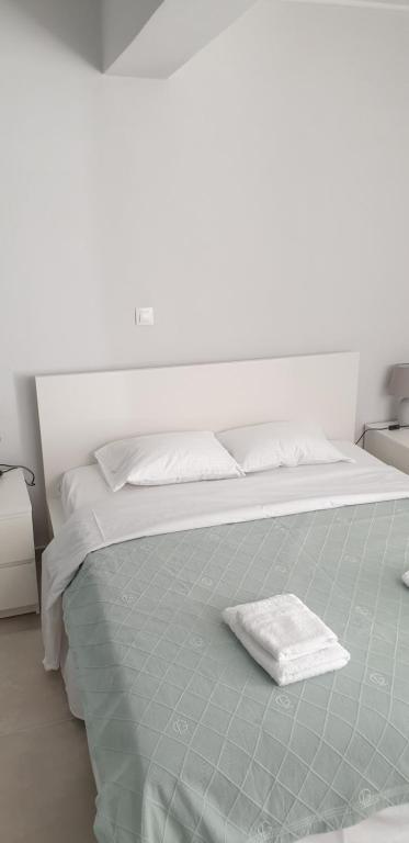 Posteľ alebo postele v izbe v ubytovaní AVR Airport Deluxe Suites 6 AIRPORT FREE SHUTLE