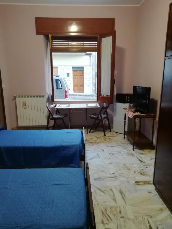 A television and/or entertainment centre at Casa Ai Cappuccini