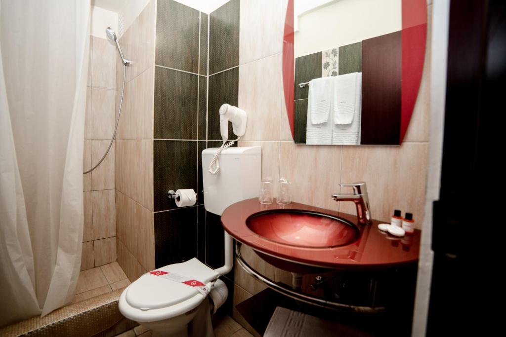 Koupelna v ubytování Hotel Corina