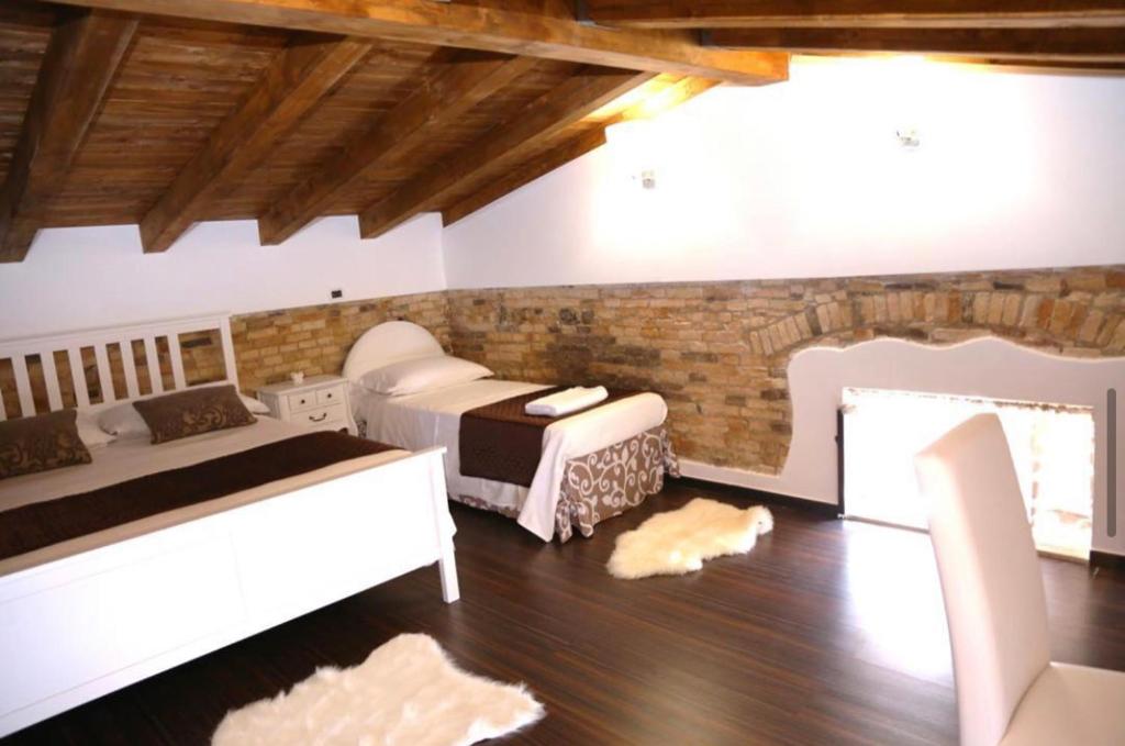 Postel nebo postele na pokoji v ubytování B&B S.Antonio
