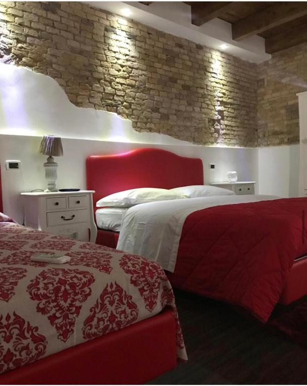 Postel nebo postele na pokoji v ubytování B&B S.Antonio