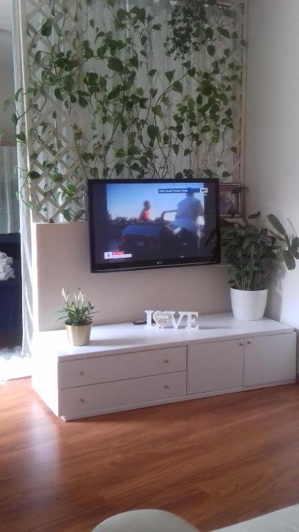 TV a/nebo společenská místnost v ubytování Casa Cris