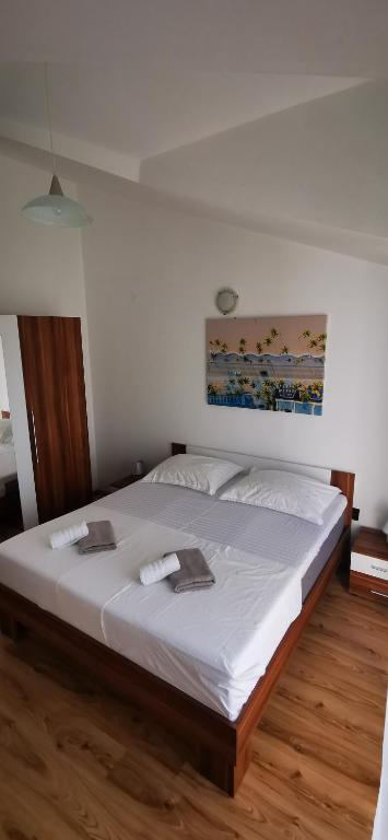 Postel nebo postele na pokoji v ubytování Apartments Marin, Kolan, Mandre, Pag