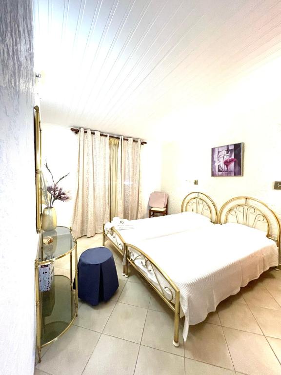 Posteľ alebo postele v izbe v ubytovaní Kommeno Bay Apartments