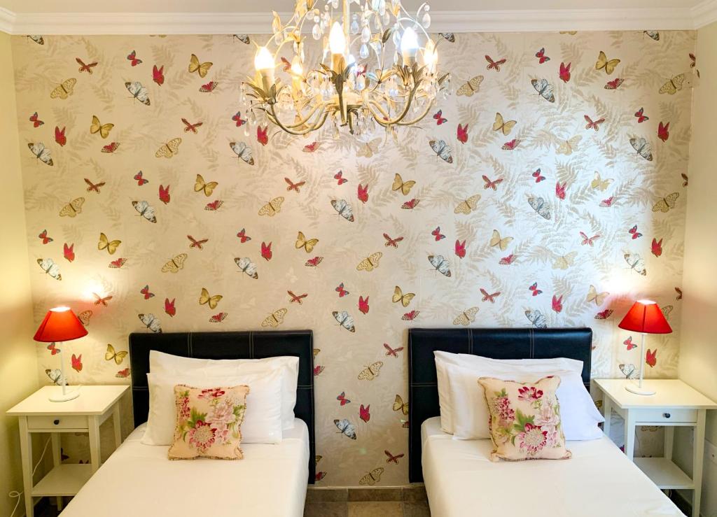 A bed or beds in a room at MARIA DEL RISCO by Buenavilla