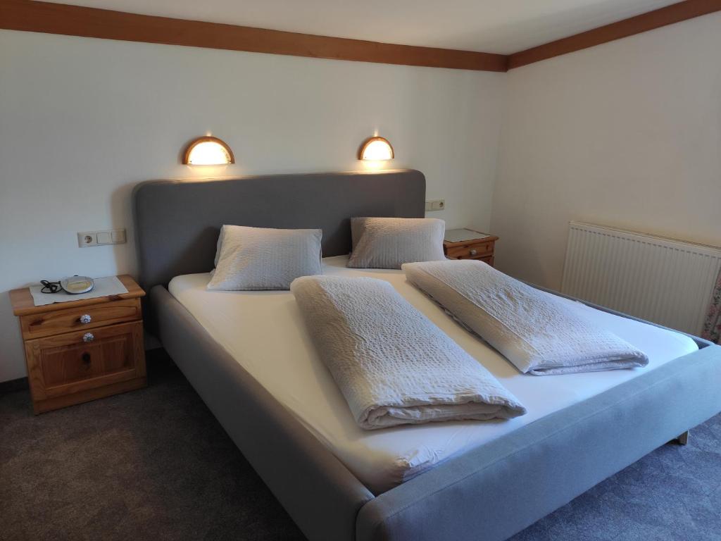 Postel nebo postele na pokoji v ubytování Ferienhaus Am Steindl "Steindlhof"