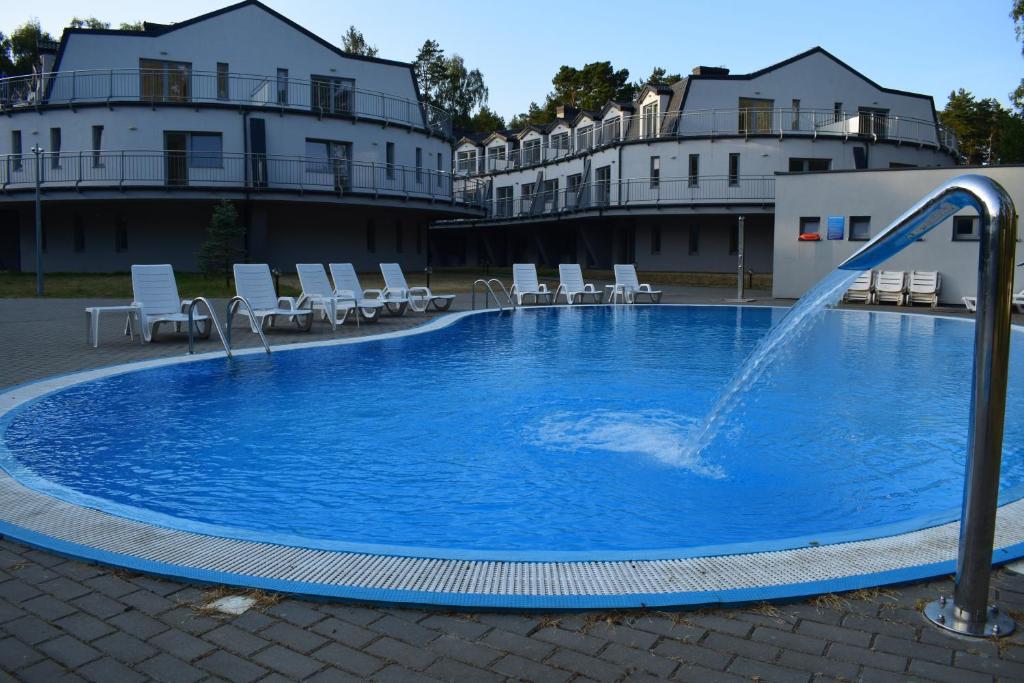 Apartament Silence Baltic Karmel tesisinde veya buraya yakın yüzme havuzu