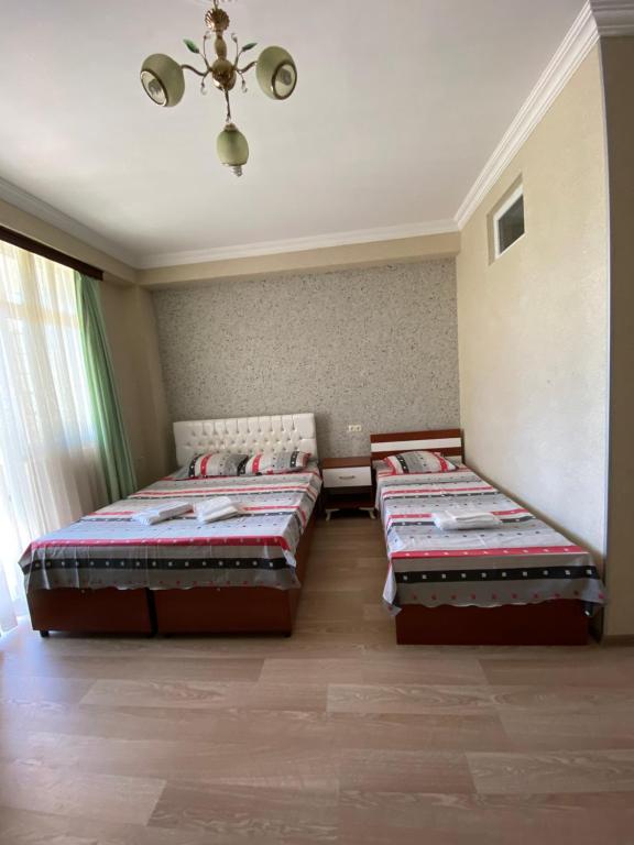 Postel nebo postele na pokoji v ubytování Hotel Eurasia