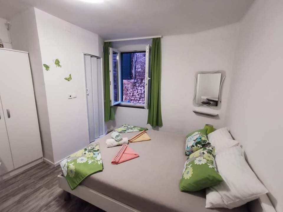 Postel nebo postele na pokoji v ubytování The Palace Mattiazzi Room